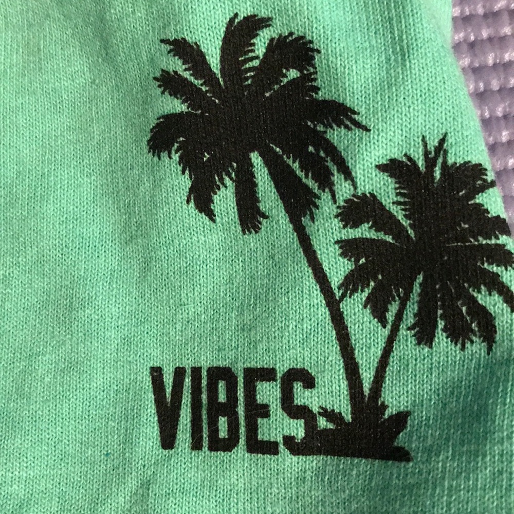 These are long lime green shorts.